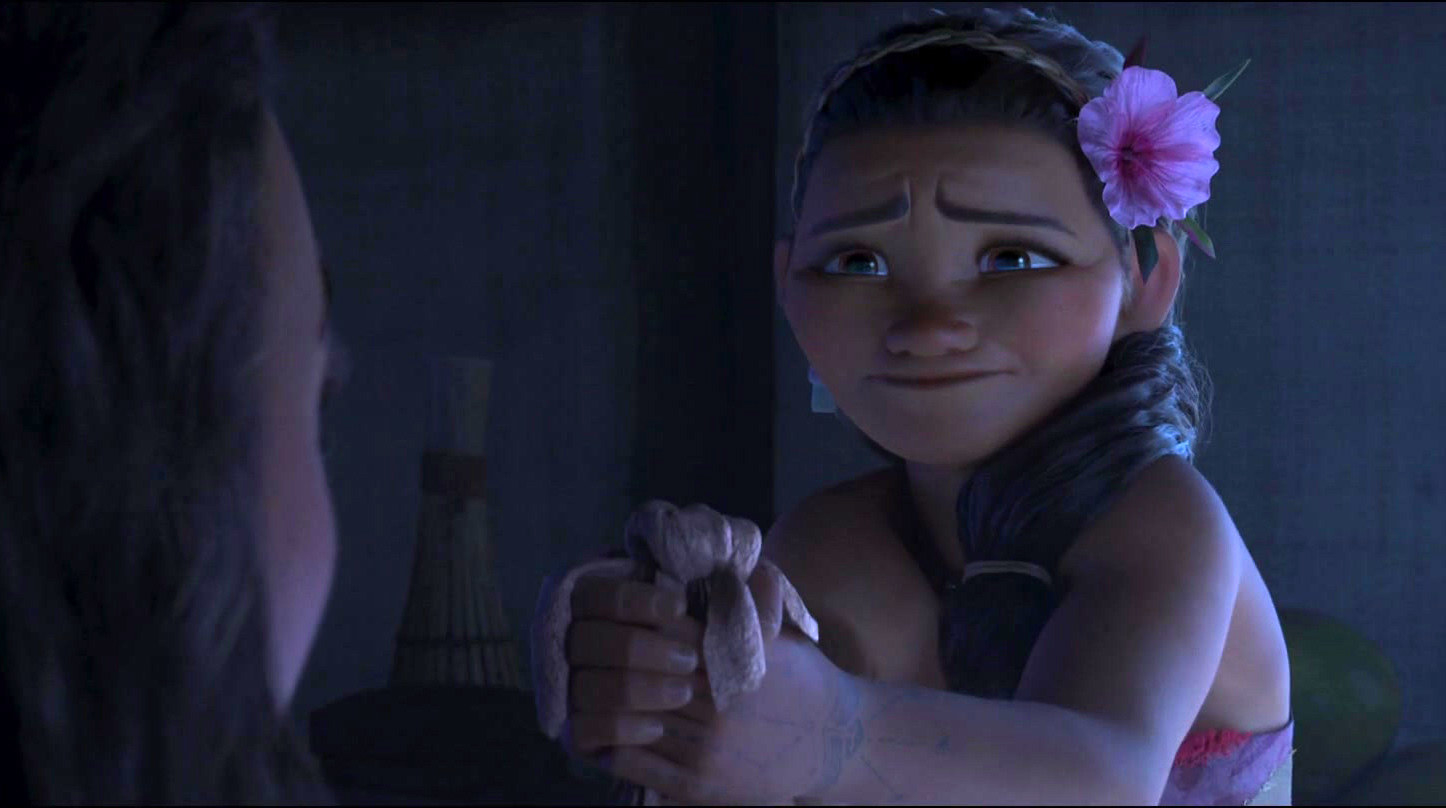 Moana&#x27;s mother handing Moana a bag with tears in her eyes