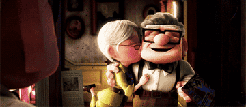 Ellie kissing Carl on the cheek at the beginning of Up