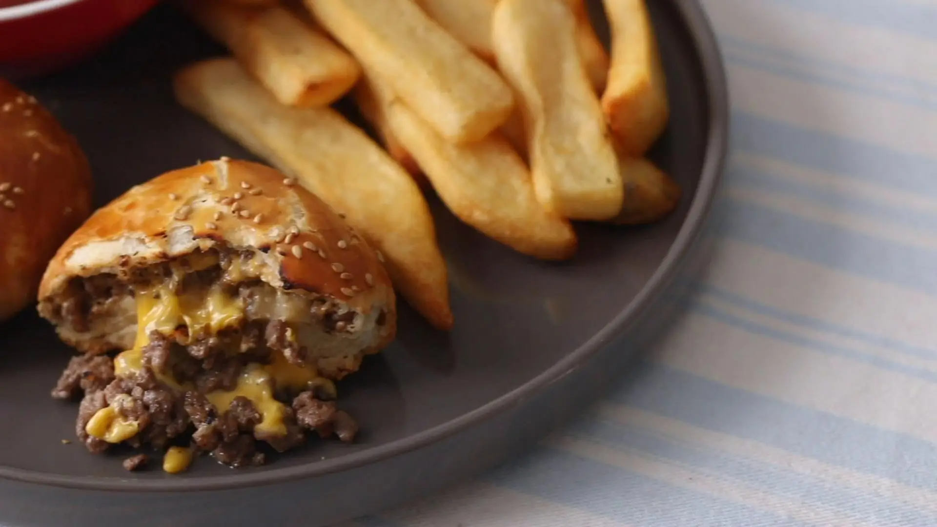 A close up of the cheeseburger