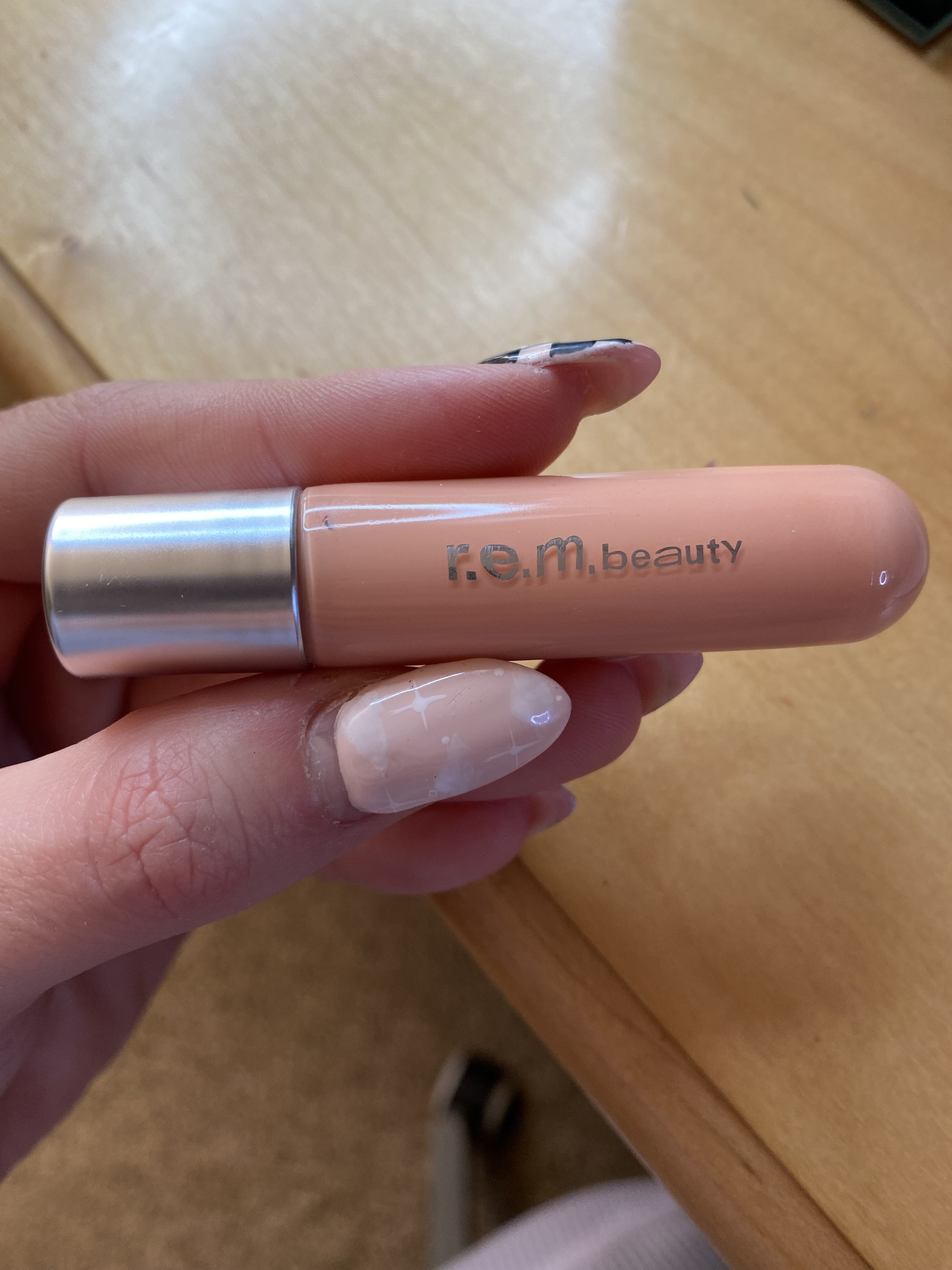 A shot of the pink, nude lip gloss