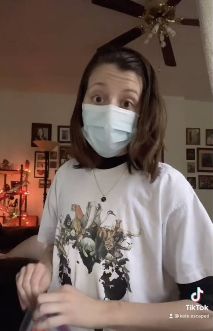Screengrabs of a TikTok by user Kate.escaped where she is wearing a facial mask and holding a plastic bag, speaking directly to the camera