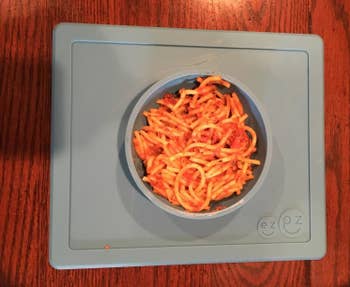 Reviewer's photo of spaghetti in a gray silicone bowl