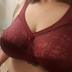 a reviewer wearing the maroon bra