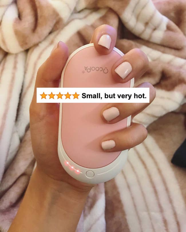The pink mouse-size warmer with five-star review text 