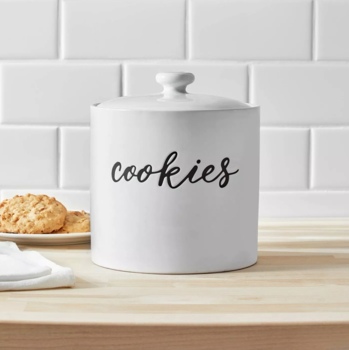 white cookie jar with the word &quot;cookies&quot; on it
