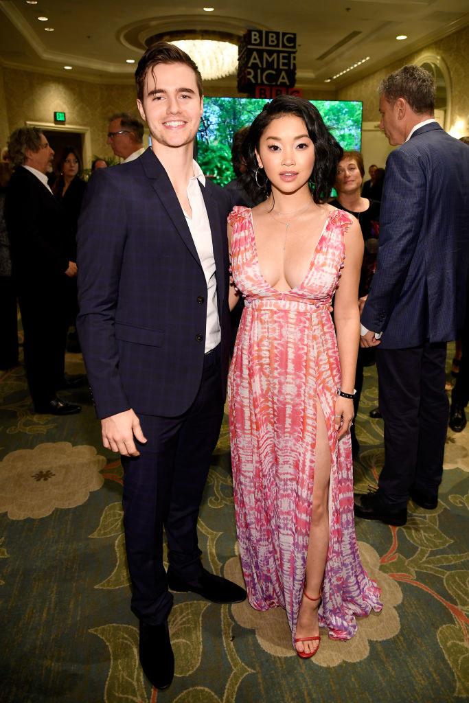 Anthony wearing a suit as he poses for a photo with Lana, who&#x27;s wearing a low-cut dress at an event