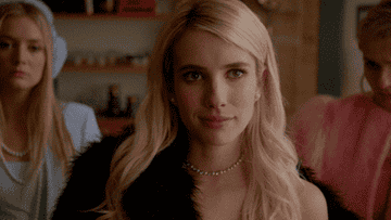 Emma Roberts flipping her hair on Scream Queens