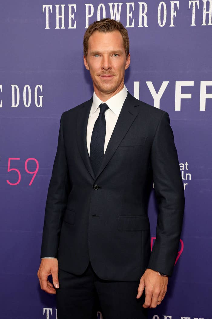 Benedict wears a suit and poses for photographers at an event for his film The Power of the Dog