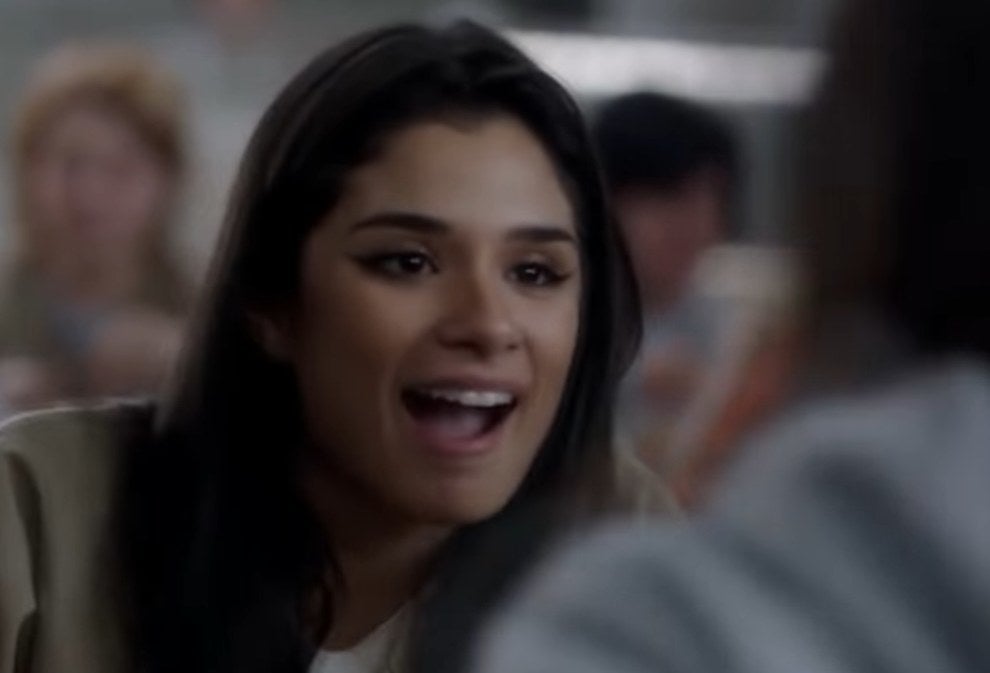 Maritza talking to her friends in the cafeteria