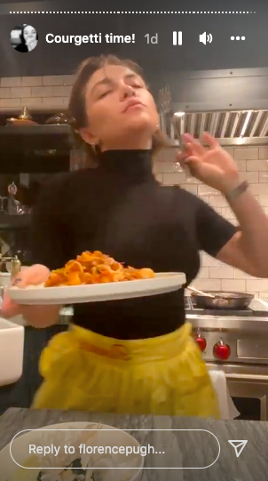 Florence dancing while eating her fresh meal