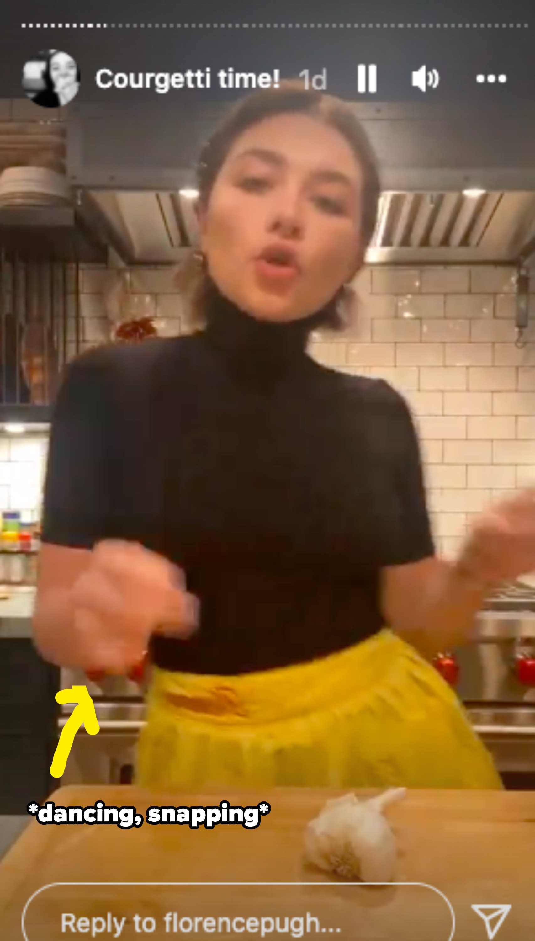 Florence dancing while cooking