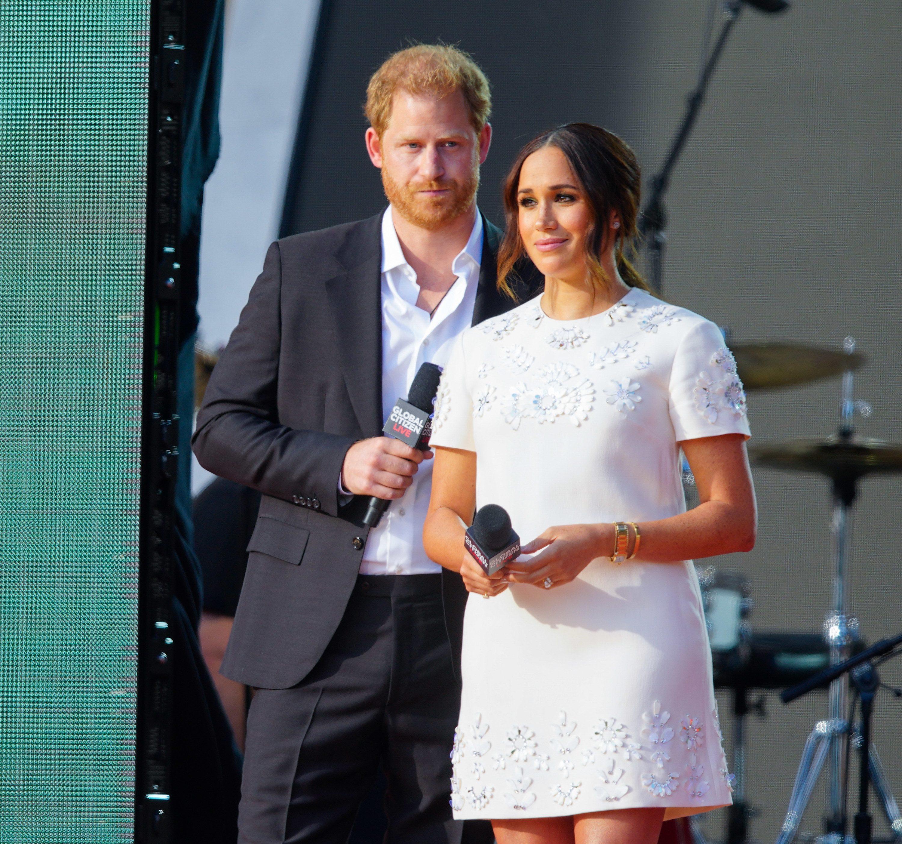 Harry and Markle step on stage together
