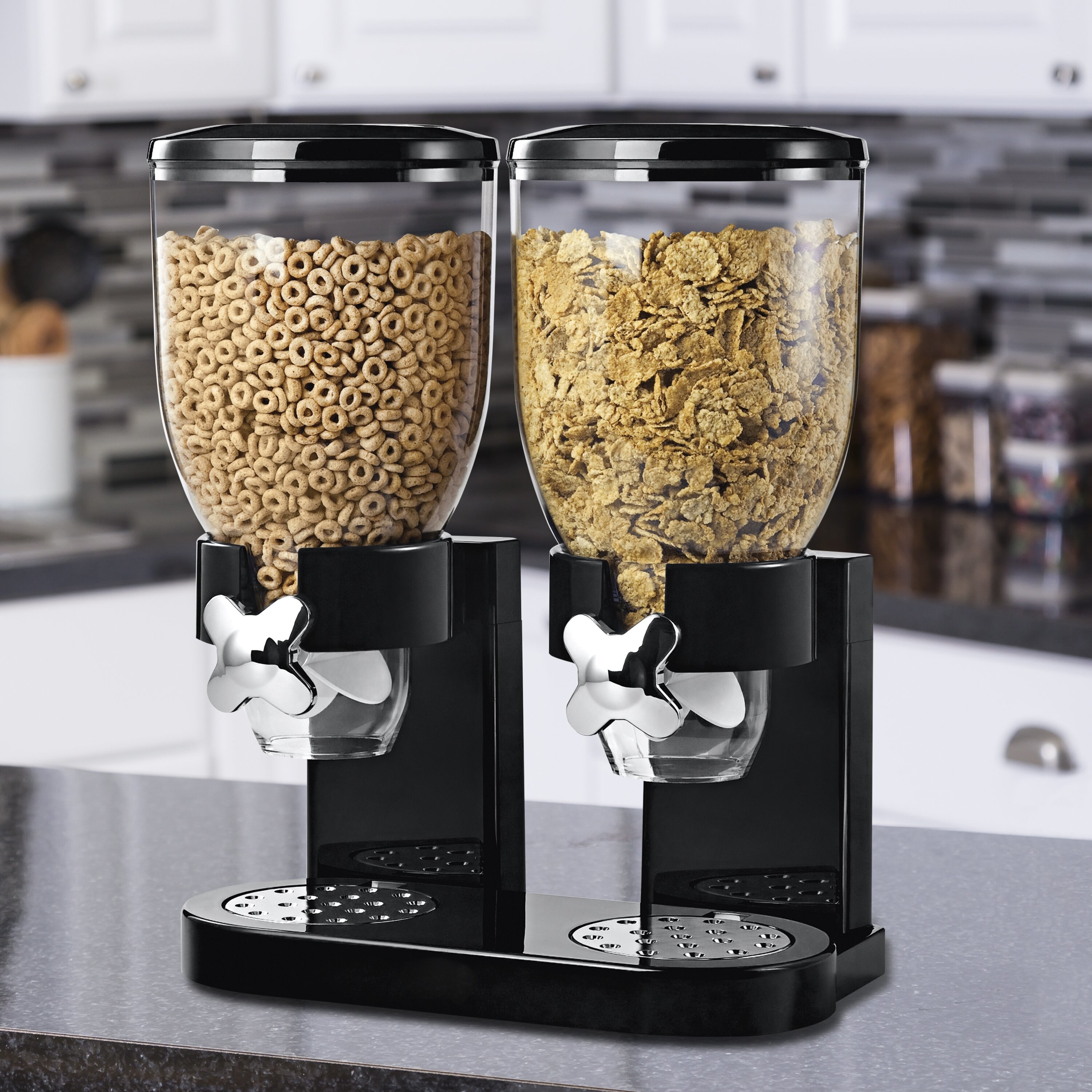 Black double cereal dispenser in kitchen filled with cheerios