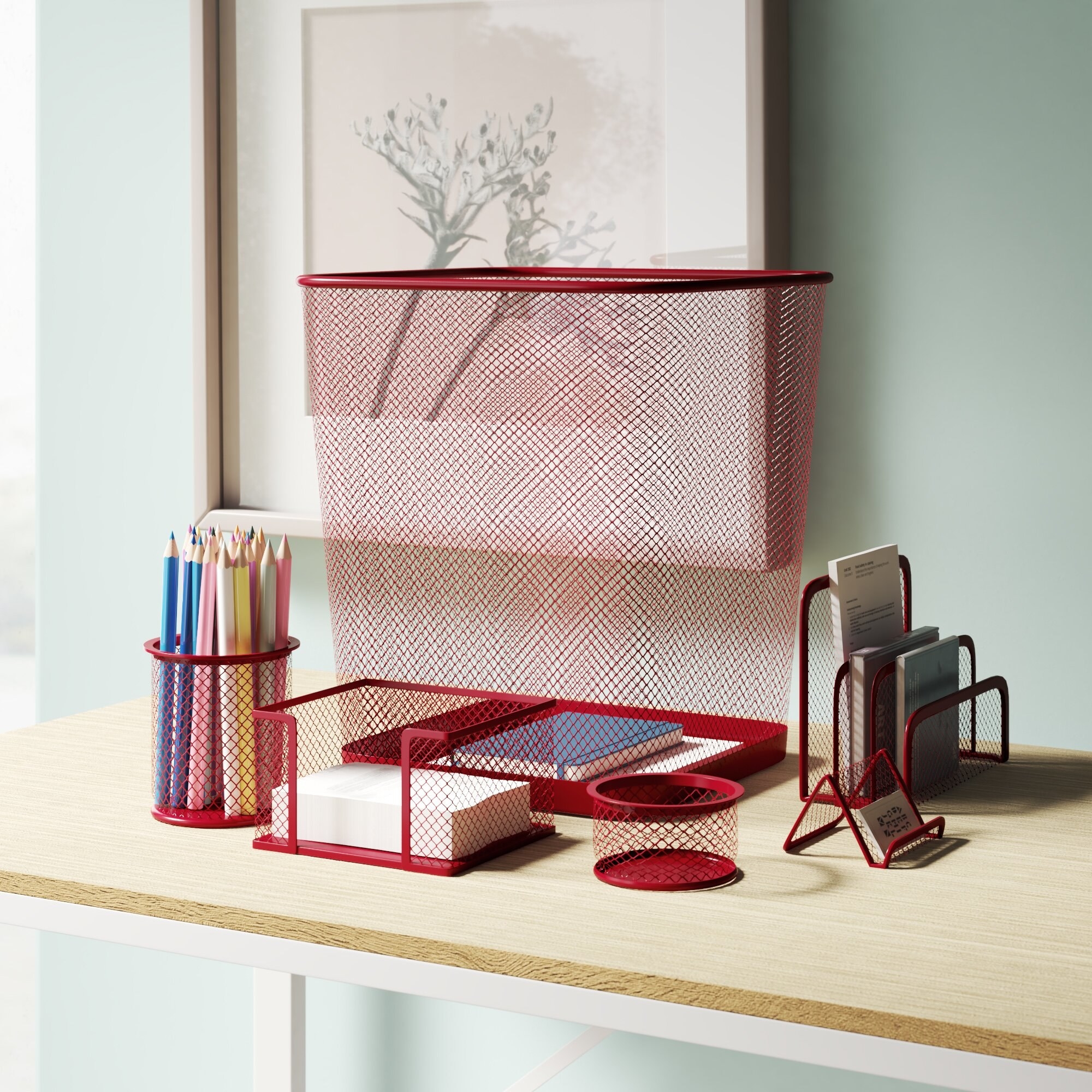 Six-piece red desk organizer set with notebooks, pencils, etc.