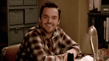 Jake Johnson as Nick Miller turns his head and widens his mouth as he narrows his eyes in &quot;New Girl&quot;