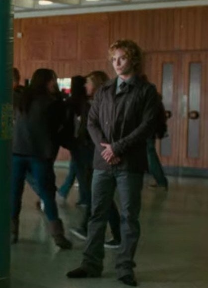 Jasper wearing jeans, a jacket, a shirt, and a tie