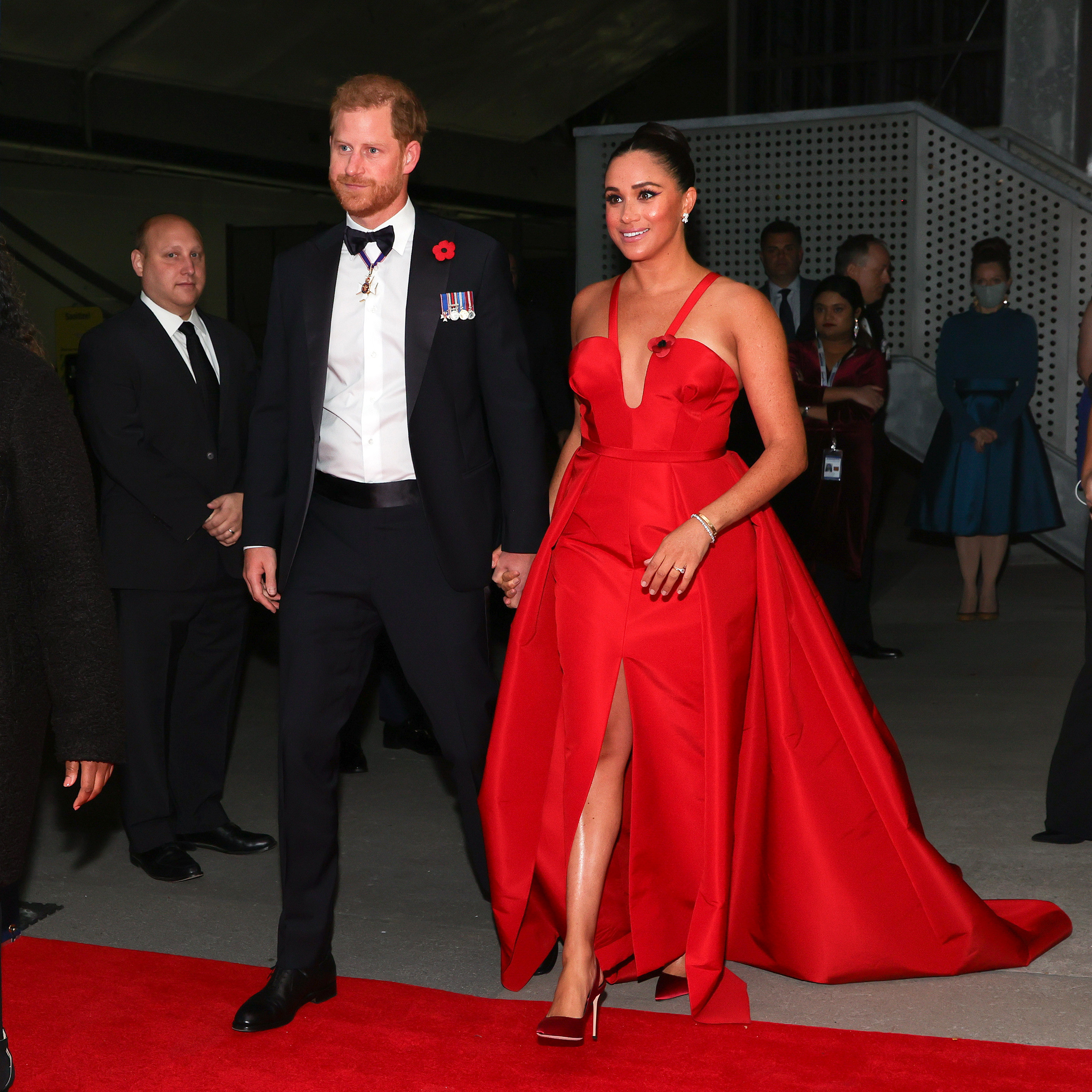 The Duke and Duchess walking into an event hand-in-hand
