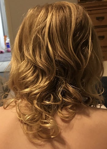 the same child with untangled ringlets