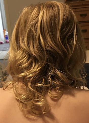 the same child with untangled ringlets
