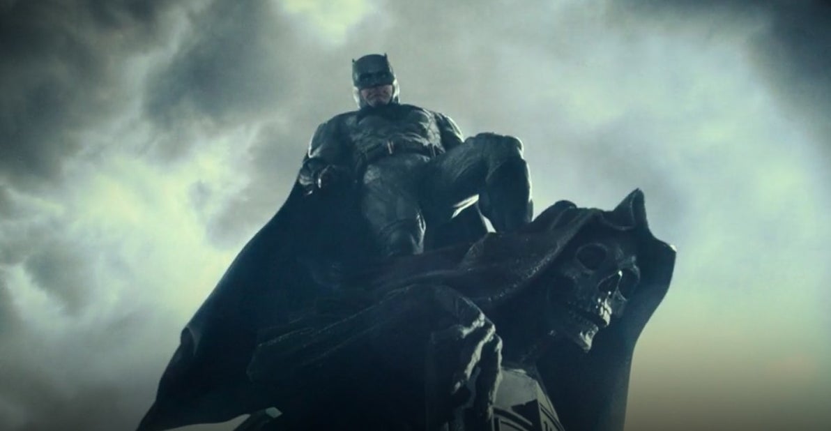 Batman standing on top of a skeleton statue in &quot;Zack Snyder&#x27;s Justice League&quot;