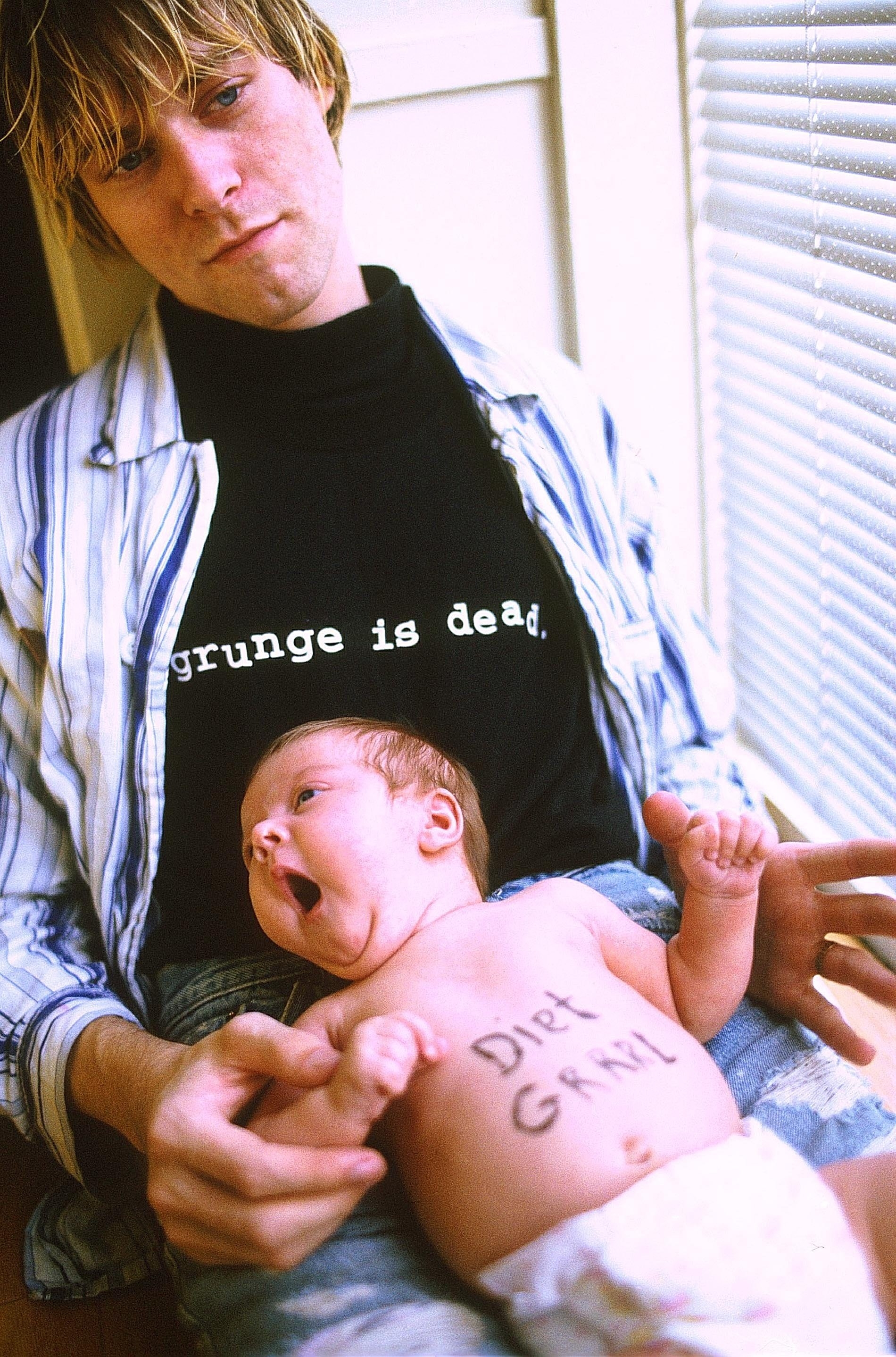 Kurt Cobain with his daughter Frances Bean