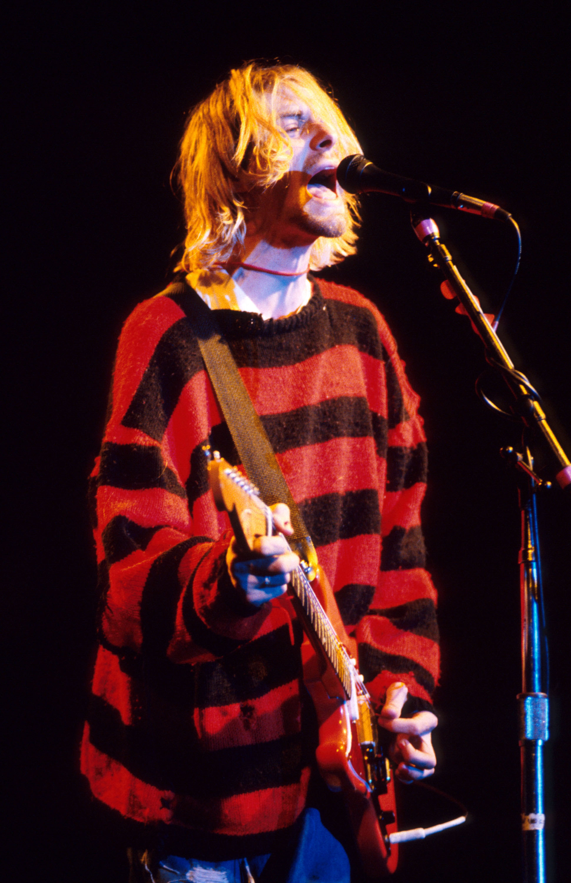 Kurt Cobain of Nirvana red and black sweater