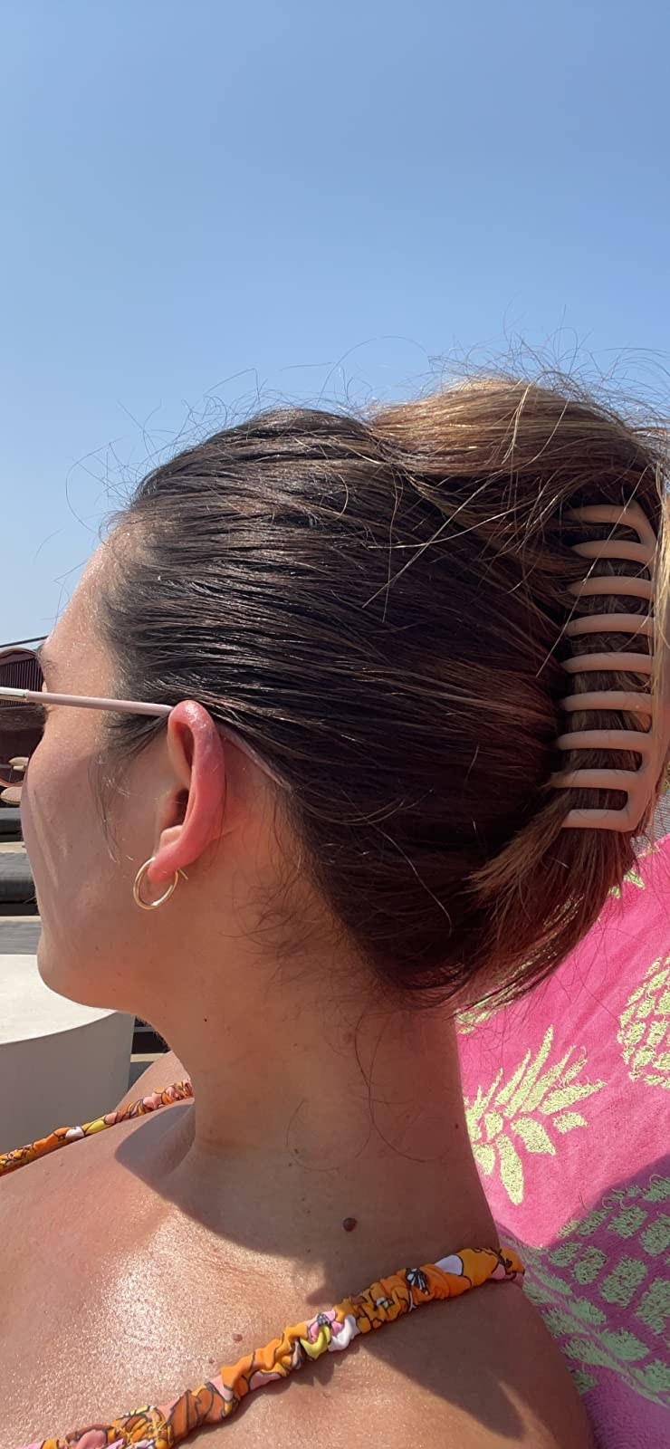 image of pink hair claw in reviewer's hair