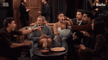 The gang from &quot;How I Met Your Father&quot; sits around on a couch with drinks in their hands and surprised expressions on their faces