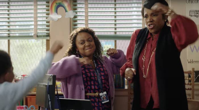 Quinta Brunson and Sheryl Lee Ralph as teachers Janine and Barbara dance in celebration with a student in &quot;Abbott Elementary&quot;