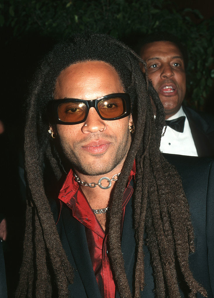 Lenny rocking long dreads and tinted sunglasses at an awards gala