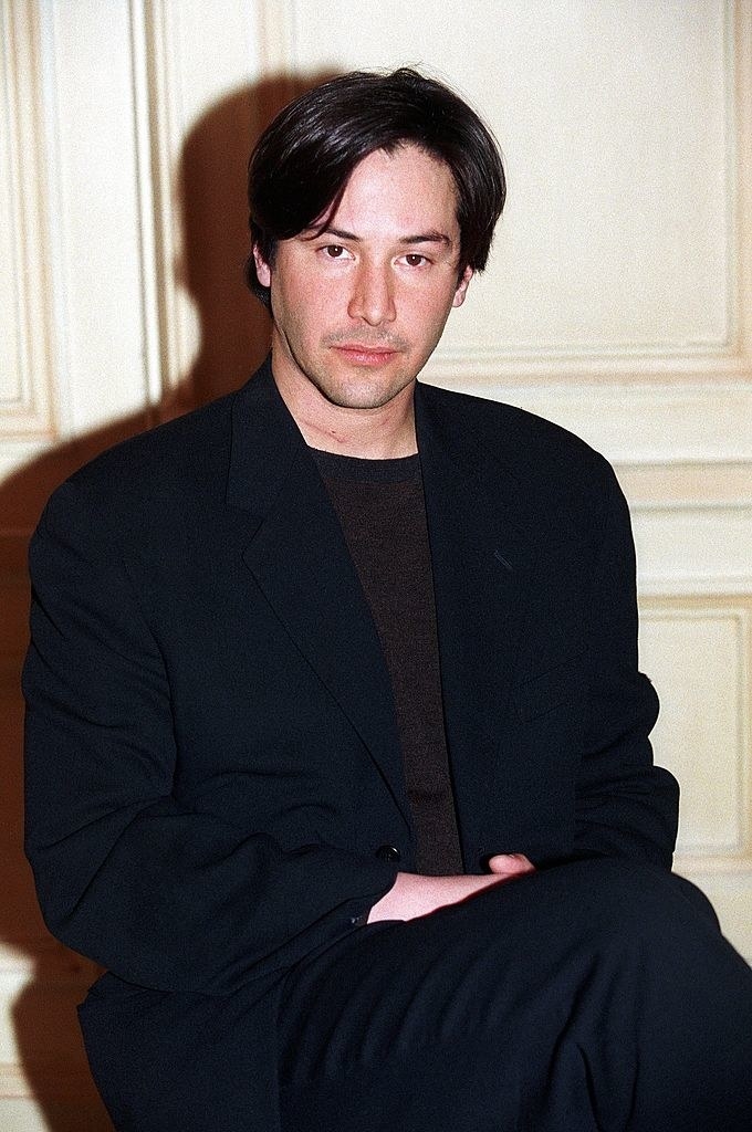 keanu is in a chair at the L&#x27;associe du diable premiere