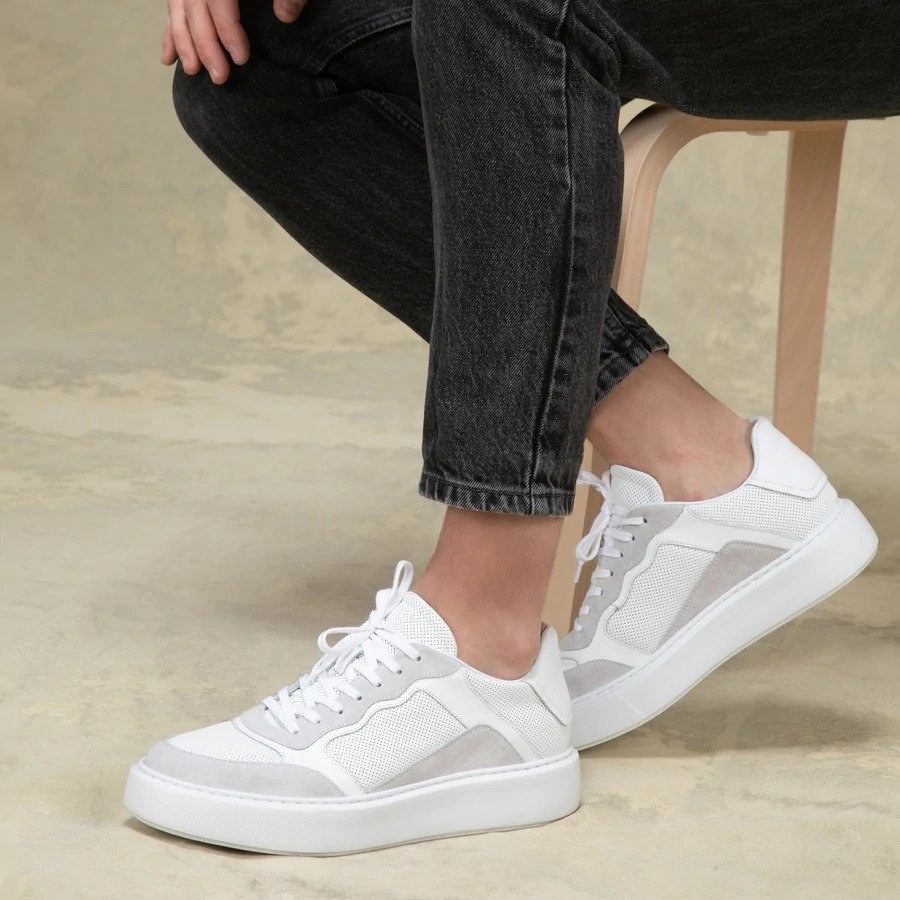 white sneakers with off white details and laces