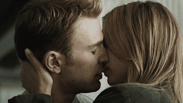 Cap and Sharon kissing
