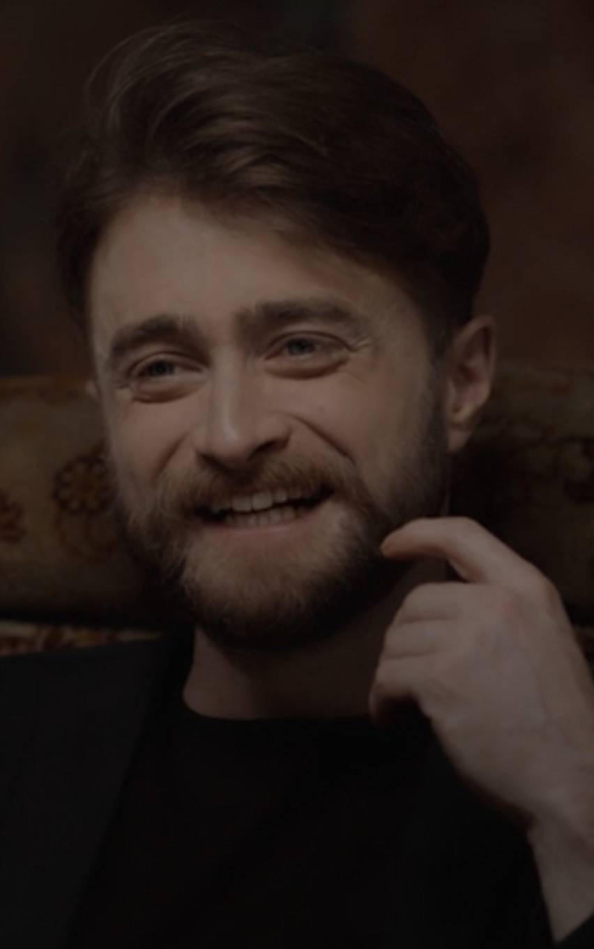 Radcliffe smiling in the reunion special
