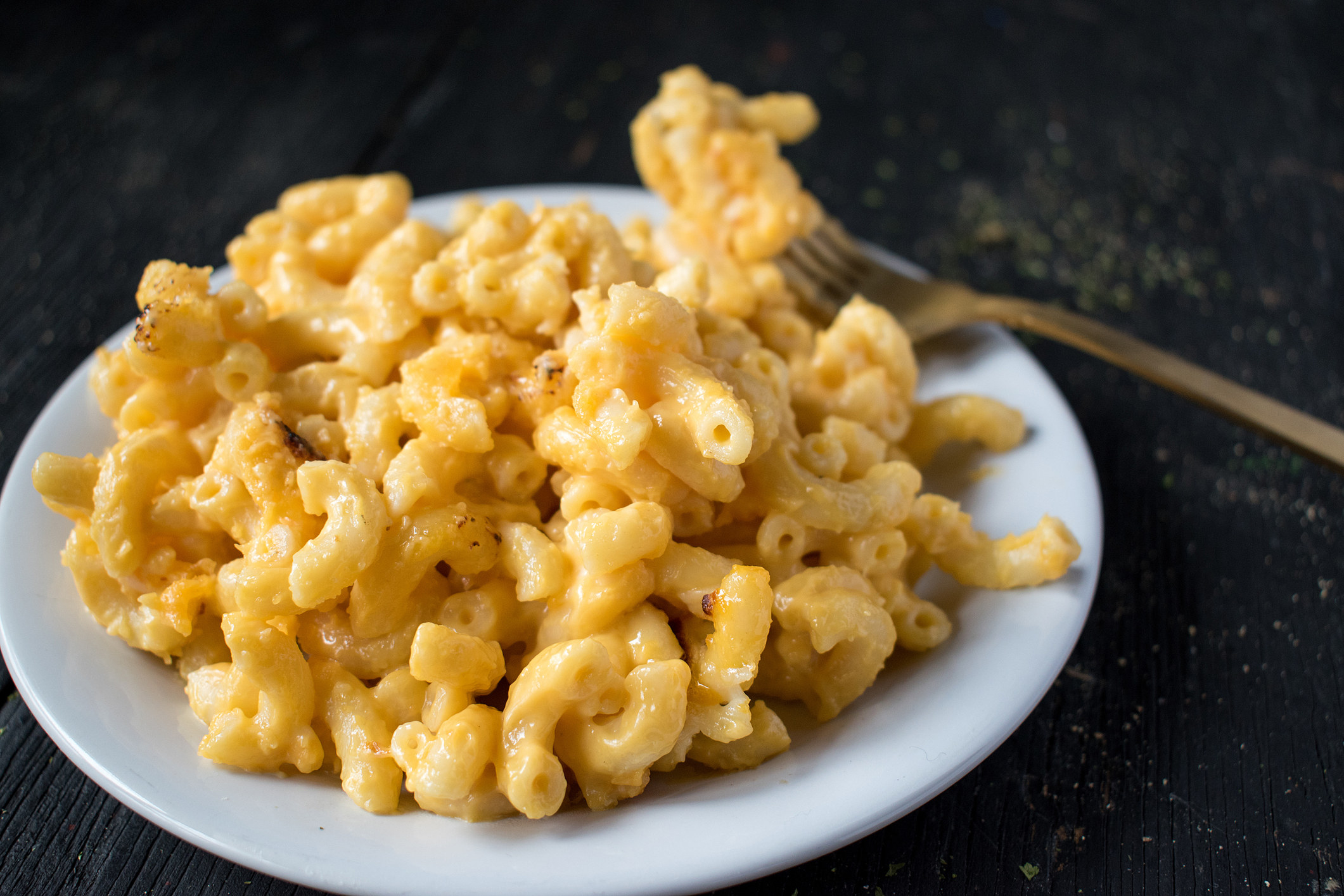 Macaroni and cheese noodles in dish.