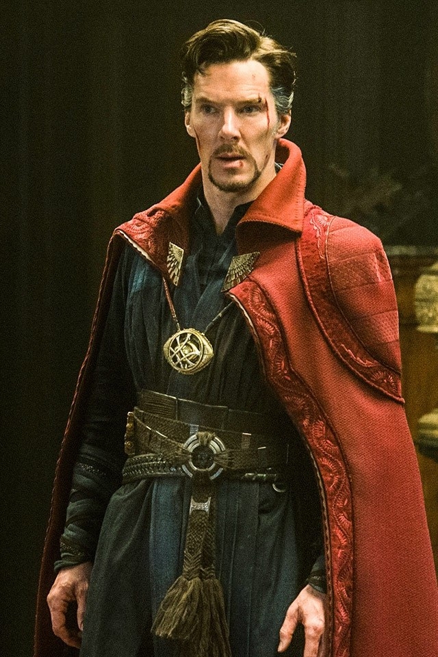 Doctor Strange wearing a red cape, and blue overlay outfit
