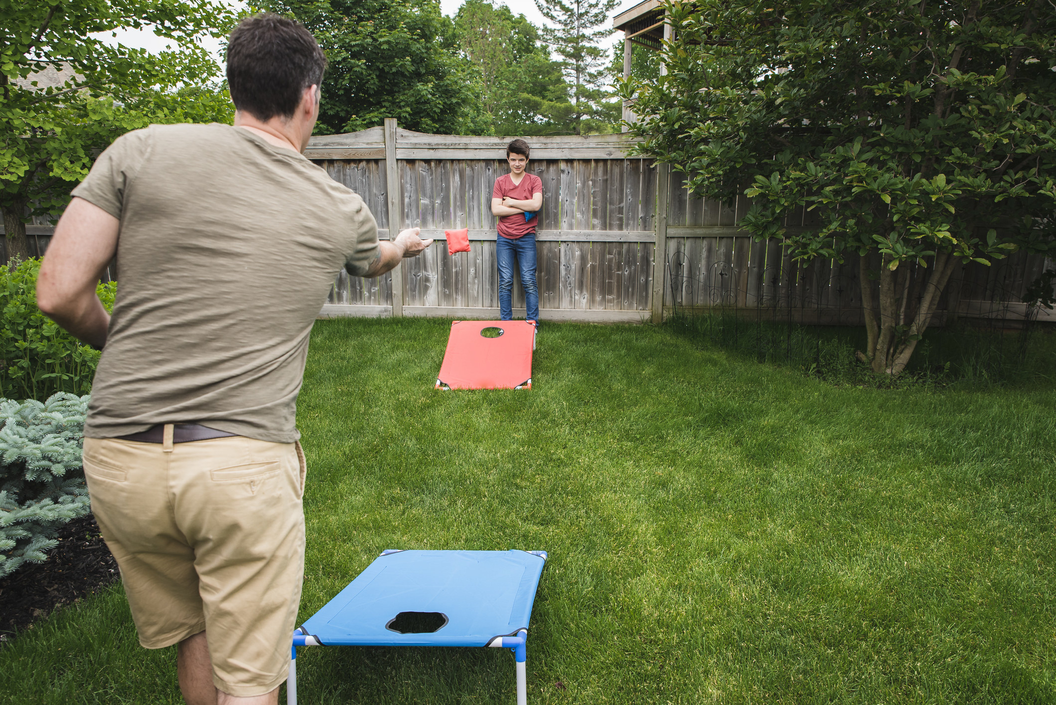 A father and son playing outdoor games