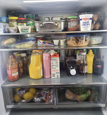 full fridge with products all around