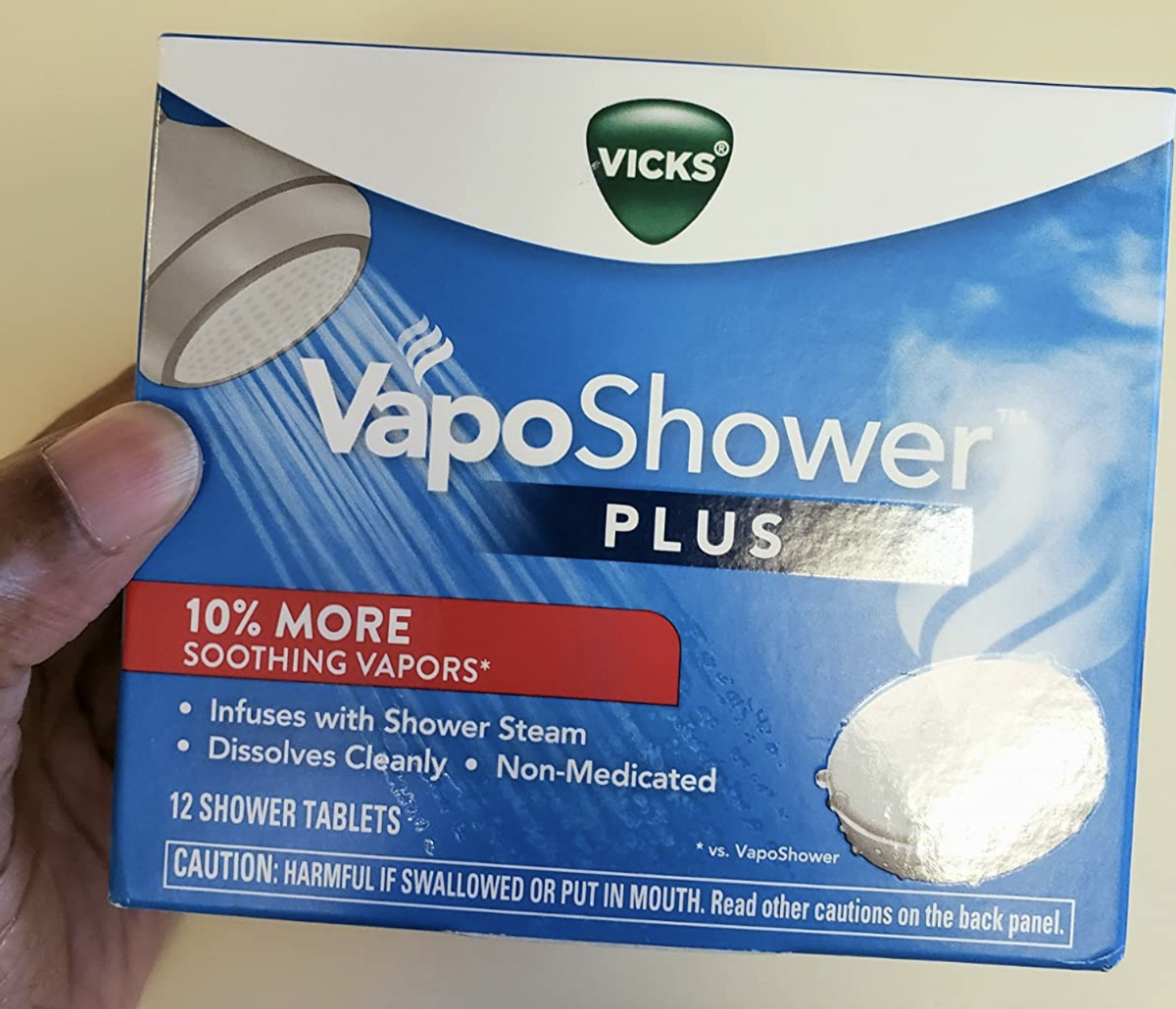 A customer review photo of the box of VapoShower tablets
