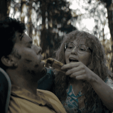 Misty feeding Coach Ben