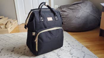 reviewer image of the black diaper bag