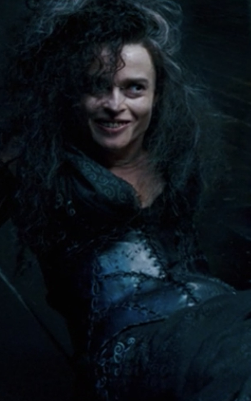 Bellatrix laughing at Harry while on the floor