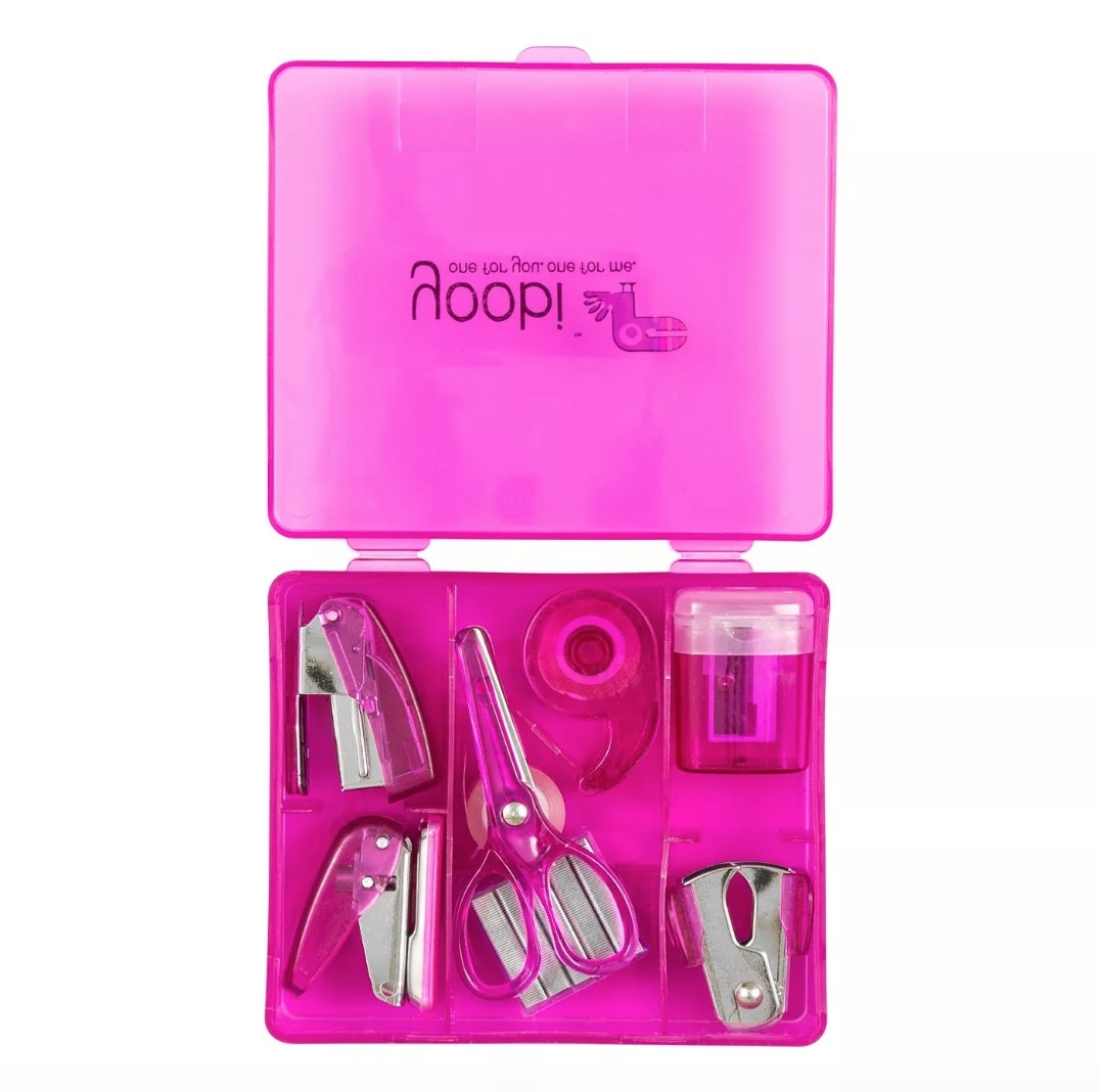 pink office supply kit with pink mini staplers, scissors, tape dispenser, pencil sharpener and staple remover