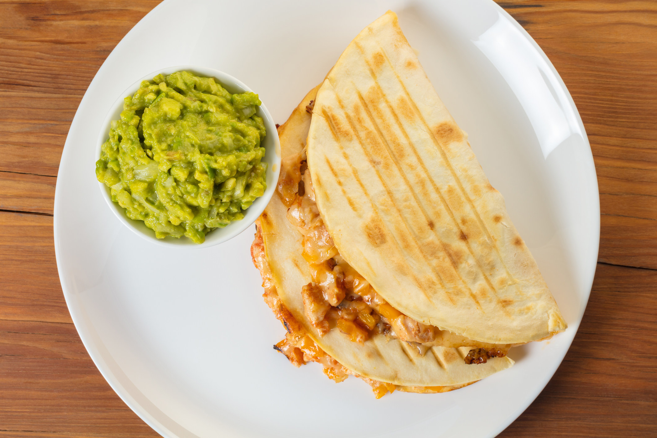 A quesadilla with guacamole.