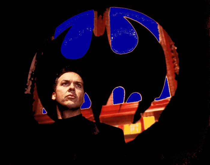 Keaton stands in front of the Bat Signal