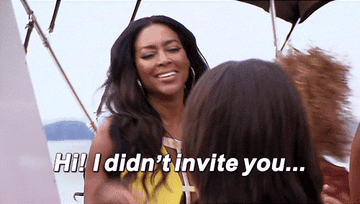 Kenya Moore walks up and says,