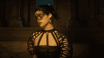 gif of a woman with a face mask on