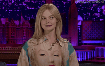 Elle Fanning making an awkward, yikes face