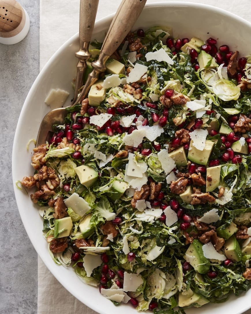 Shredded Brussels sprouts with Parmesan, walnuts, and pomegranate.