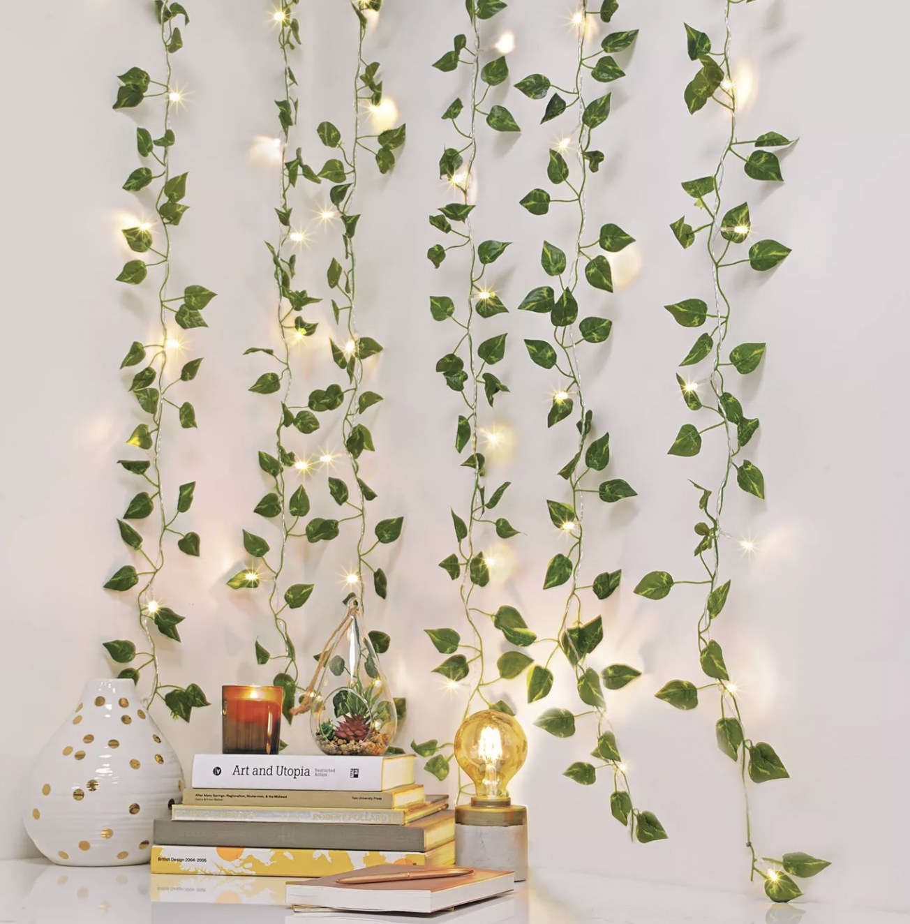 The vine curtain lights hanging from a wall